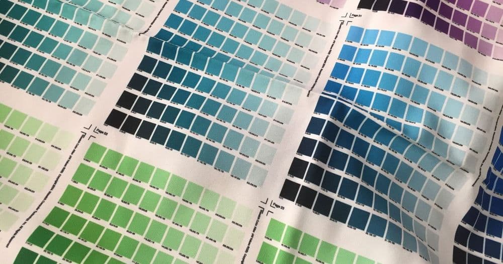 Printed color swatch sheets used to check color mode and print accuracy